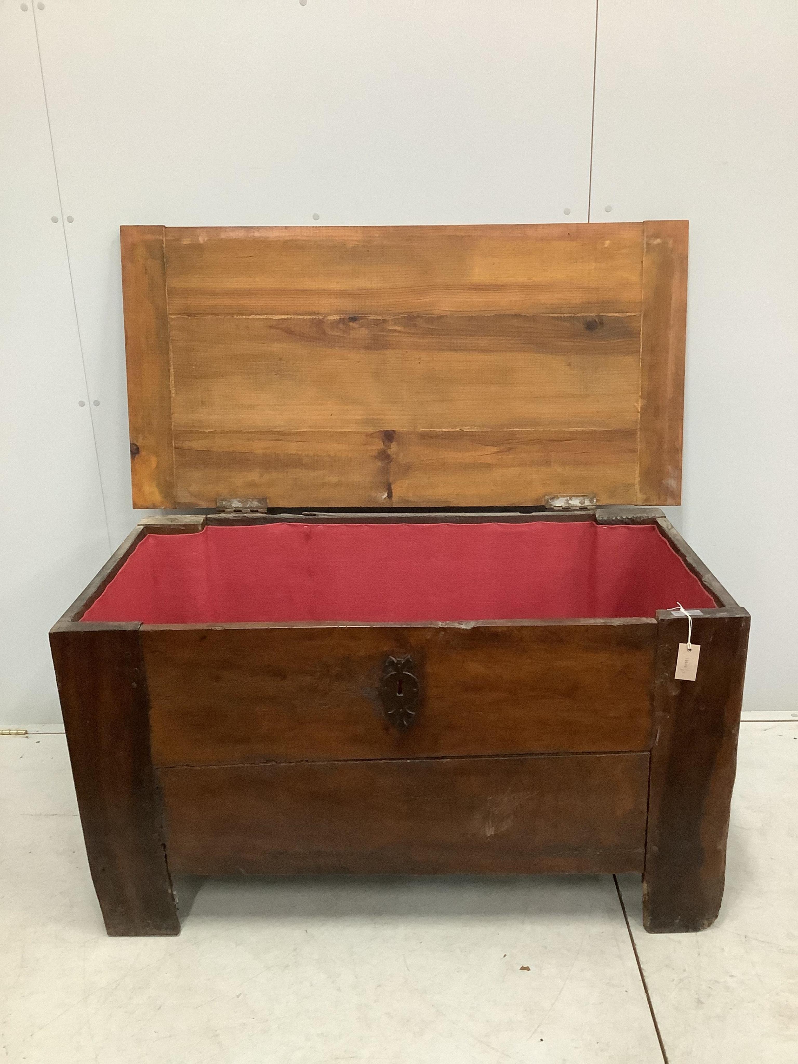 An 18th century and later French oak and fruit wood coffer, width 129cm, depth 65cm, height 71cm. Condition - fair, with later top